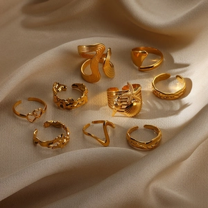 9-piece gold snake irregular geometric adjustable ring set with shell and heart motifs