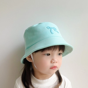 Detail of mint green children bucket hat with bow embroidery and white chin strap