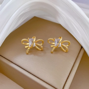 Elegant gold bow earrings with square-cut crystal and micro-pave on silk fabric