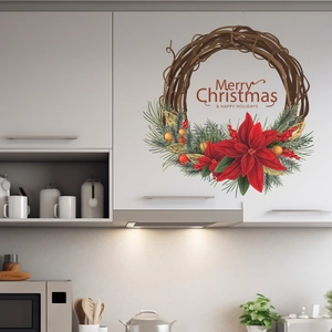 Christmas wreath wall sticker with pine leaves and gold accents on a white kitchen cabinet