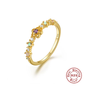 Detailed close-up of S925 sterling silver ring with multi-color zircon stones and gold finish