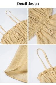 Detail design of a beige summer dress showing adjustable straps and pleated fabric texture