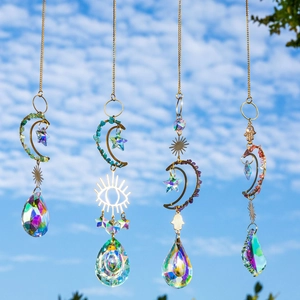 Set of four celestial crystal suncatchers with moon and star prisms for window decor
