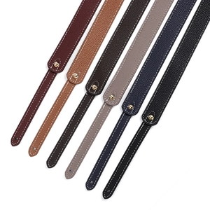 Collection of replacement leather bag straps in various colors with gold rivets