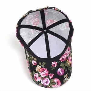Floral print baseball cap with romantic rose pattern and structured black inner frame