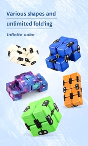 Macro view of infinite cubes in various colors and textures for stress relief and folding