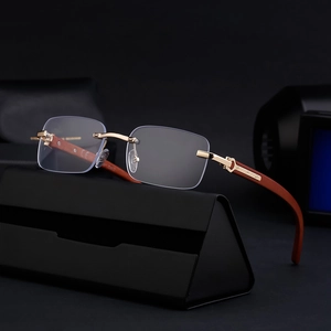Retro rimless sunglasses with gold metal bridge and brown wood grain textured temples