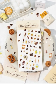 Close-up of dessert-themed stickers with hand-drawn cakes and ice cream icons
