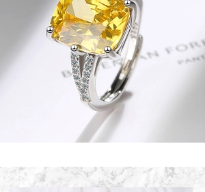 Macro shot of S925 sterling silver ring with large yellow cushion cut gemstone