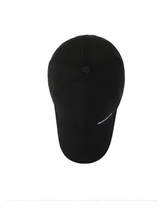 Detail view of breathable mesh fabric and SPORTS lettering on black running cap
