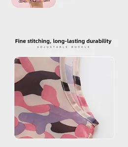 Detail of pink camouflage bag showing fine double stitching and adjustable buckle