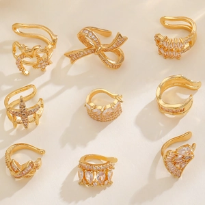 9-teiliges Earcuff-Set in Gold mit Bogen-, Stern- und Monddesign und Zirkonia-Steinen