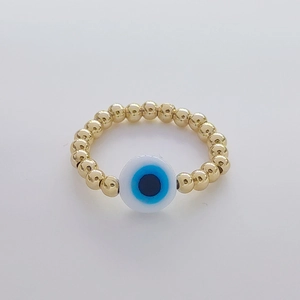 18K gold-plated beaded ring featuring a blue evil eye charm on light background