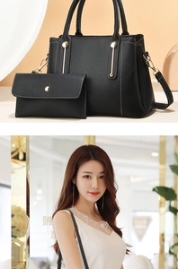 Detail of black lychee leather handbag set with white stitching and model showcase