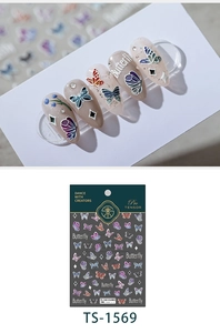 Macro detail of 5D embossed butterfly nail stickers with glitter finish on TS-1569