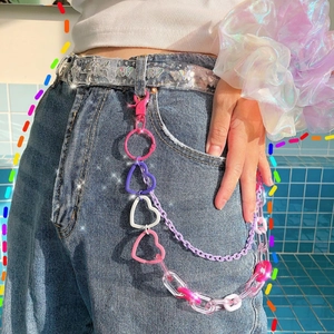 Colorful resin pants chain with pink and purple heart links on denim jeans