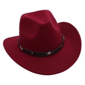 Detail of burgundy wool cowboy hat with leather band, silver stars and metal studs
