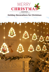Detail of Christmas LED string lights with warm white Santa and reindeer hanging ornaments