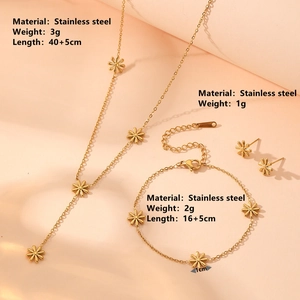 Golden stainless steel daisy floral jewelry set with necklace, bracelet and earrings