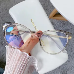 Cat-eye TR90 anti-blue light glasses in light tea color with gold metal temples