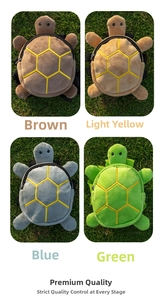Detail view of four colorful plush turtle backpacks for pets on green grass background