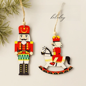 Christmas nutcracker wooden ornaments in festive colors with pine needle decorations