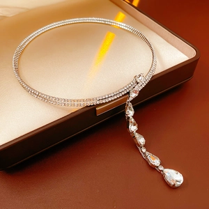 Close-up of double layer silver teardrop pendant necklace inside a luxury leather box