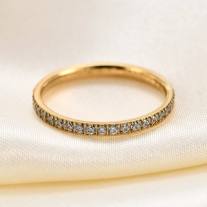 2mm wide gold stainless steel ring with a full row of pave set clear cubic zirconia