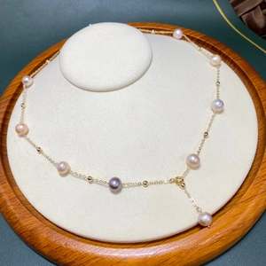 Long adjustable 14K gold-filled necklace with natural freshwater pearls in assorted colors