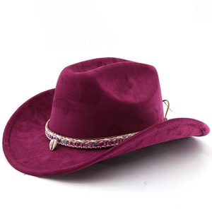 Detail of burgundy wool fedora featuring colorful woven band and natural shell pendant