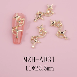 Macro view of gold alloy hollow star nail charms with wave chain details for DIY manicure