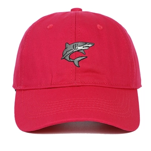 Close-up of gray shark embroidery on bright pink twill cotton baseball cap
