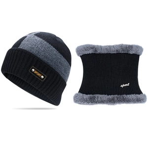 Close-up of winter knit beanie and neck warmer set with warm grey faux fur lining