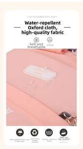 Water-resistant pink oxford fabric detail for large school backpack with high durability