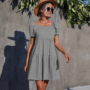 Minimalist grey square neck knit mini dress with puff sleeves and layered tiered skirt