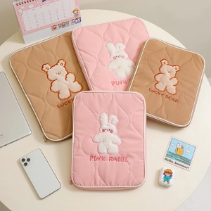 Detailed embroidery of rabbit and lucky bear on 13 inch pink and khaki laptop sleeves