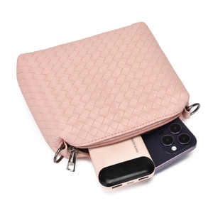 Pink woven clutch shown with smartphone and power bank inside for capacity display
