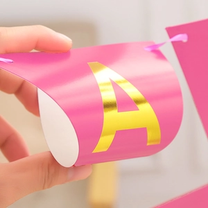 Pink triangle pennant banner with gold foil letter A for happy birthday party decoration