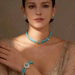 Luxurious turquoise bead necklace set with gold vintage floral pendants and matching earrings