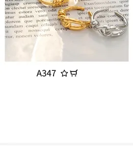 Macro shot of gold-plated titanium steel chain link ring on vintage script paper