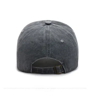 Detail view of washed cotton baseball cap back with adjustable metal buckle and stitching