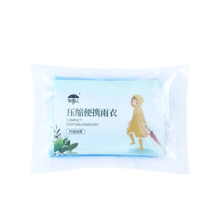 Blue portable compressed raincoat in compact packaging for travel and outdoor use