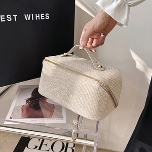 Sparkling champagne gold makeup organizer bag with handle and dual zipper design