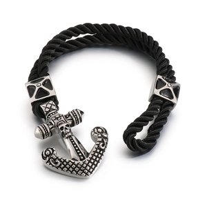 Men's braided black leather bracelet with vintage silver anchor and skull pendant