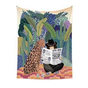 Bohemian tapestry featuring artistic illustration of a woman reading with a leopard