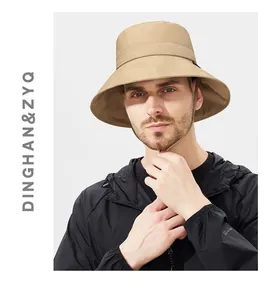 Detail of khaki waterproof sun hat with adjustable windproof cord for outdoor activities