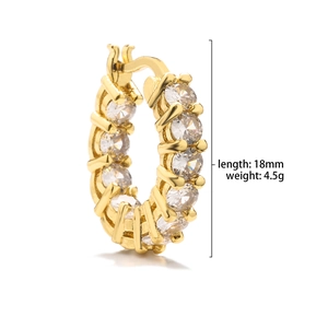 Detail of 18mm golden huggie earrings with cubic zirconia stones showing 4.5g weight