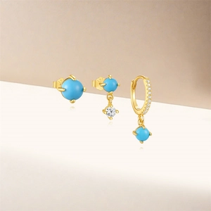 Macro detail of S925 silver earring set with turquoise beads and zircon stones