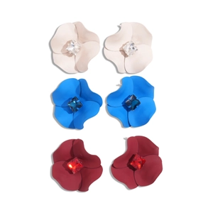 Three pairs of floral stud earrings in beige, blue, and burgundy with crystal centers