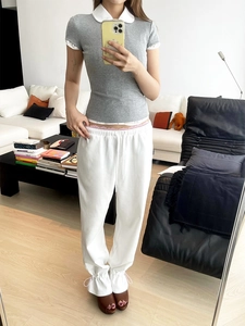 Slim fit grey short sleeve T-shirt with white collar paired with white drawstring pants